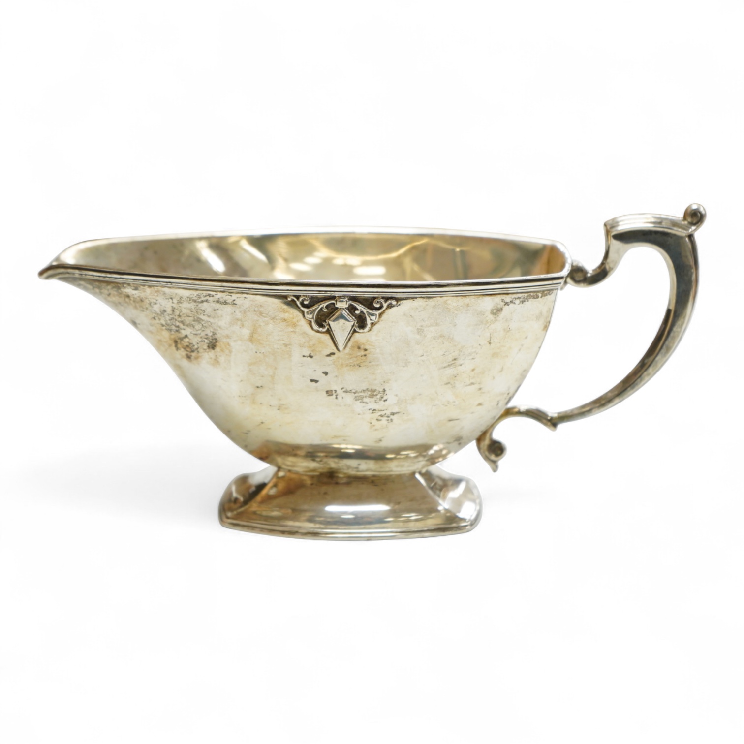 A George VI silver sauceboat by Mappin & Webb, Sheffield, 1938, with engraved initial, length 20cm, 6.9oz.